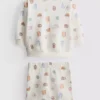 0–18 Monate | Set aus Sweatshirt und Shorts mit Lebensmittel-Motiv 0–18 Monate | Set aus Sweatshirt und Shorts mit Lebensmittel-Motiv