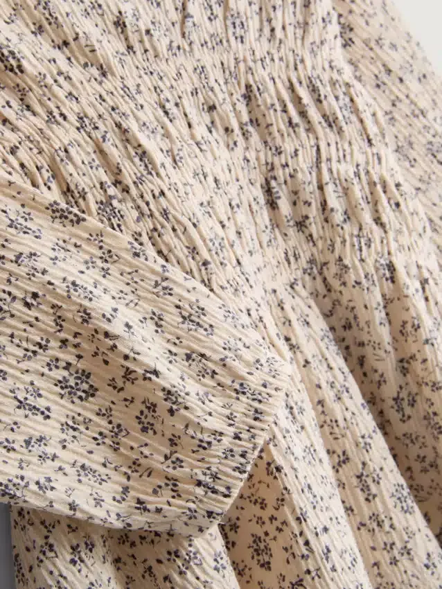 0–36 Monate | Set aus langärmeligem Oberteil und Hose mit Blumenmuster aus Crinkle-Stoff 0–36 Monate | Set aus langärmeligem Oberteil und Hose mit Blumenmuster aus Crinkle-Stoff