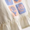1,5–8 Jahre | Besticktes Set aus Oberteil mit Schößchen und Hose 1,5–8 Jahre | Besticktes Set aus Oberteil mit Schößchen und Hose