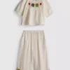 1,5–8 Jahre | Set aus gehäkelter Bluse und Hose 1,5–8 Jahre | Set aus gehäkelter Bluse und Hose