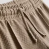 1,5–8 Jahre | Set aus Jacquard-Jacke mit Reißverschluss und Jogginghose 1,5–8 Jahre | Set aus Jacquard-Jacke mit Reißverschluss und Jogginghose