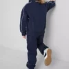 1,5–8 Jahre | Set aus Sweatshirt mit Trichterkragen und Jogginghose 1,5–8 Jahre | Set aus Sweatshirt mit Trichterkragen und Jogginghose