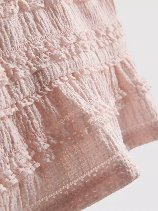 1,5–9 Jahre | Ärmellose Bluse mit Schößchen 1,5–9 Jahre | Ärmellose Bluse mit Schößchen