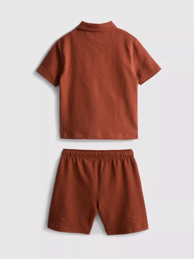 1–9 Jahre | Set aus strukturiertem Poloshirt und Shorts 1–9 Jahre | Set aus strukturiertem Poloshirt und Shorts