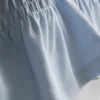 7–15 Jahre | gerafftes Peplum-Hemd 7–15 Jahre | gerafftes Peplum-Hemd