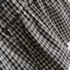 7–15 Jahre | gerafftes, ärmelloses Kleid mit Gingham-Muster 7–15 Jahre | gerafftes, ärmelloses Kleid mit Gingham-Muster