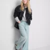 7–15 Jahre | Jeans mit weitem Bein und Schlitz am Saum 7–15 Jahre | Jeans mit weitem Bein und Schlitz am Saum