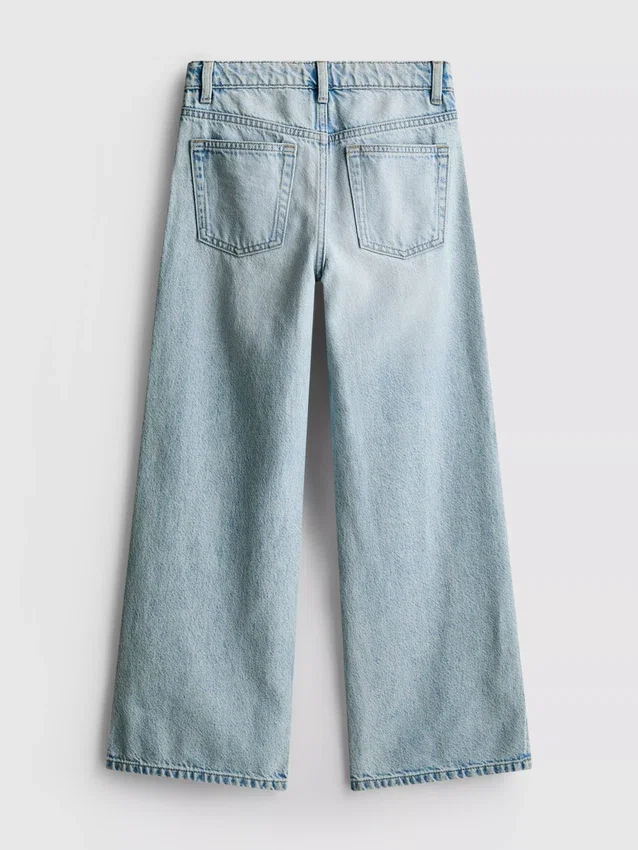 7–15 Jahre | Jeans mit weitem Bein und Schlitz am Saum 7–15 Jahre | Jeans mit weitem Bein und Schlitz am Saum