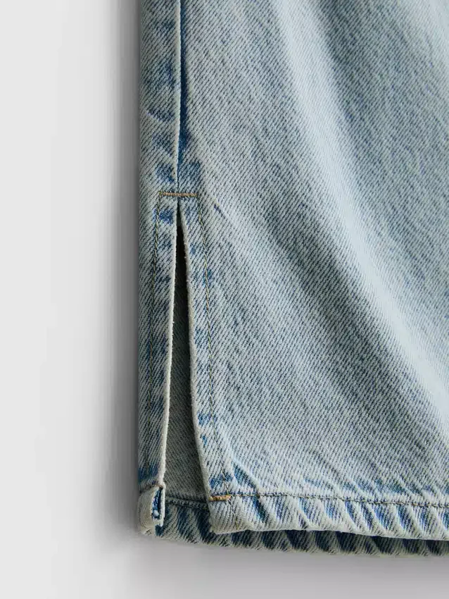 7–15 Jahre | Jeans mit weitem Bein und Schlitz am Saum 7–15 Jahre | Jeans mit weitem Bein und Schlitz am Saum