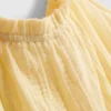 7–15 Jahre | Playsuit mit Schleife 7–15 Jahre | Playsuit mit Schleife