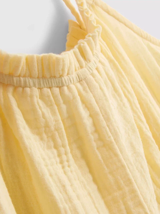 7–15 Jahre | Playsuit mit Schleife 7–15 Jahre | Playsuit mit Schleife