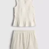 7–15 Jahre | Set aus gerafftem, ärmellosem Oberteil und Shorts 7–15 Jahre | Set aus gerafftem, ärmellosem Oberteil und Shorts