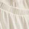 7–15 Jahre | Set aus gerafftem, ärmellosem Oberteil und Shorts 7–15 Jahre | Set aus gerafftem, ärmellosem Oberteil und Shorts