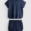 7–15 Jahre | Set aus kastenförmigem T-Shirt und Läufershorts 7–15 Jahre | Set aus kastenförmigem T-Shirt und Läufershorts