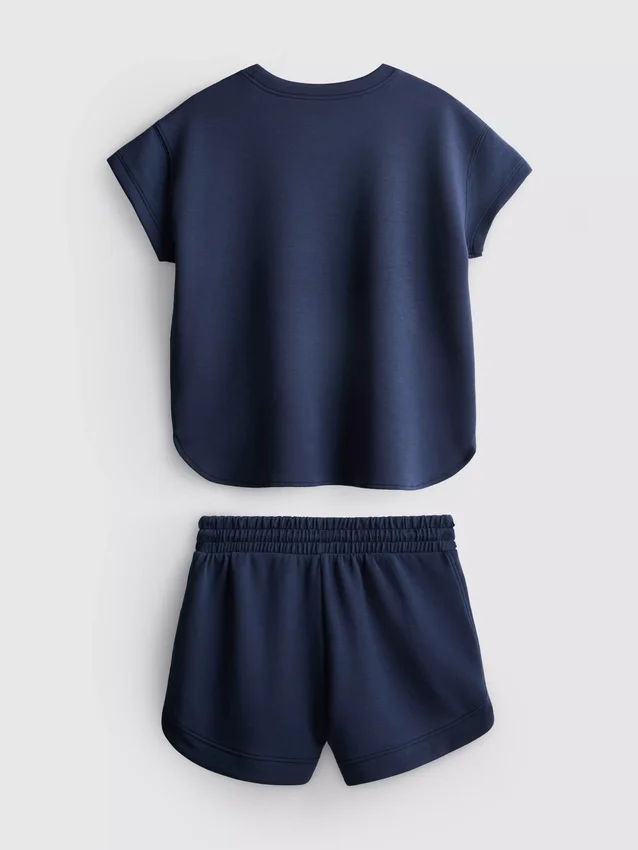 7–15 Jahre | Set aus kastenförmigem T-Shirt und Läufershorts 7–15 Jahre | Set aus kastenförmigem T-Shirt und Läufershorts