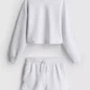 7–15 Jahre | Set aus Sweatshirt und Laufshorts 7–15 Jahre | Set aus Sweatshirt und Laufshorts