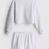7–15 Jahre | Set aus Sweatshirt und Laufshorts 7–15 Jahre | Set aus Sweatshirt und Laufshorts
