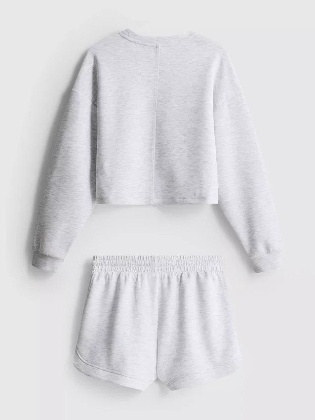 7–15 Jahre | Set aus Sweatshirt und Laufshorts 7–15 Jahre | Set aus Sweatshirt und Laufshorts