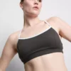 Aktives Crop-Top mit kontrastfarbener Paspelierung und gekreuztem Rücken Aktives Crop-Top mit kontrastfarbener Paspelierung und gekreuztem Rücken