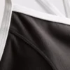 Aktives Crop-Top mit kontrastfarbener Paspelierung und gekreuztem Rücken Aktives Crop-Top mit kontrastfarbener Paspelierung und gekreuztem Rücken