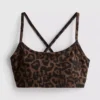 Aktives Crop-Top mit Racerback im Leopardenmuster Aktives Crop-Top mit Racerback im Leopardenmuster