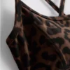 Aktives Crop-Top mit Racerback im Leopardenmuster Aktives Crop-Top mit Racerback im Leopardenmuster