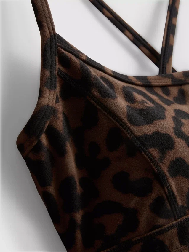 Aktives Crop-Top mit Racerback im Leopardenmuster Aktives Crop-Top mit Racerback im Leopardenmuster