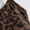 Aktives Crop-Top mit Racerback im Leopardenmuster Aktives Crop-Top mit Racerback im Leopardenmuster