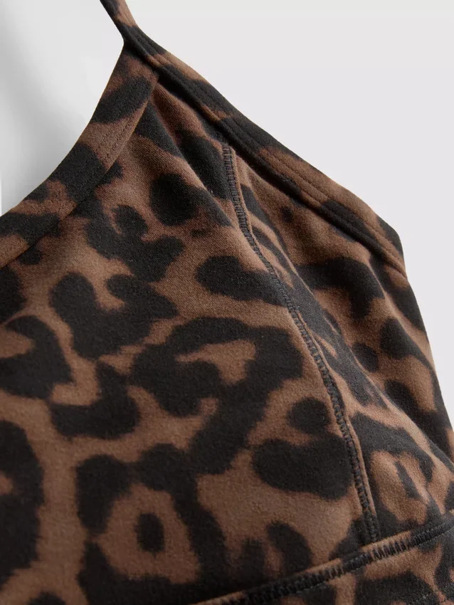Aktives Crop-Top mit Racerback im Leopardenmuster Aktives Crop-Top mit Racerback im Leopardenmuster