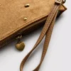 Armbandtasche mit Herz-Nieten