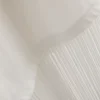 Asymmetrisches T-Shirt aus Baumwolle mit Fransen Asymmetrisches T-Shirt aus Baumwolle mit Fransen