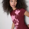 Baby-T-Shirt aus Baumwolle mit Blumendruck Baby-T-Shirt aus Baumwolle mit Blumendruck