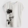 Baby-T-Shirt aus Baumwolle mit Blumendruck Baby-T-Shirt aus Baumwolle mit Blumendruck