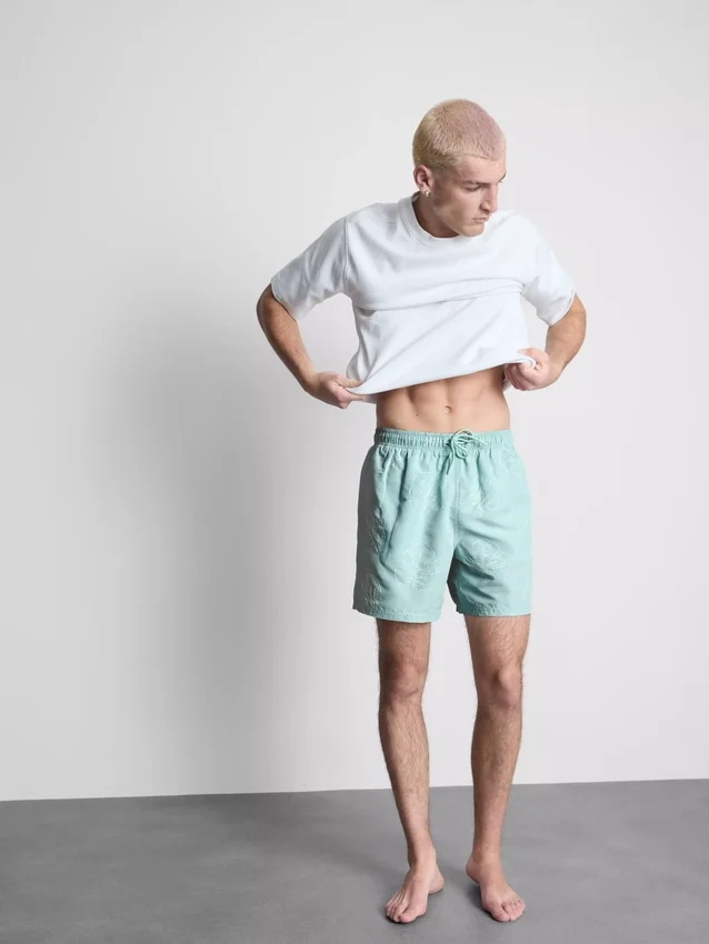 Badeshorts mit Blattstickerei Badeshorts mit Blattstickerei