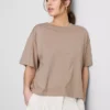 Bauchiges Baumwoll-T-Shirt mit Rundhalsausschnitt Bauchiges Baumwoll-T-Shirt mit Rundhalsausschnitt