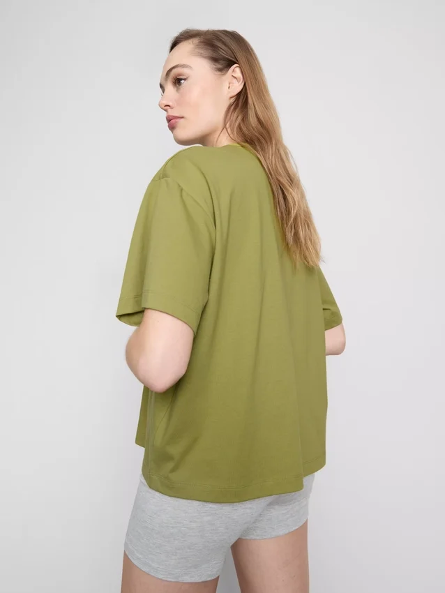 Bauchiges Baumwoll-T-Shirt mit Rundhalsausschnitt Bauchiges Baumwoll-T-Shirt mit Rundhalsausschnitt