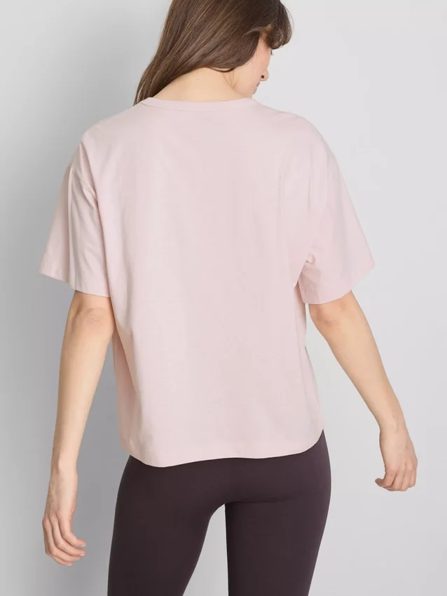 Bauchiges Baumwoll-T-Shirt mit Rundhalsausschnitt Bauchiges Baumwoll-T-Shirt mit Rundhalsausschnitt
