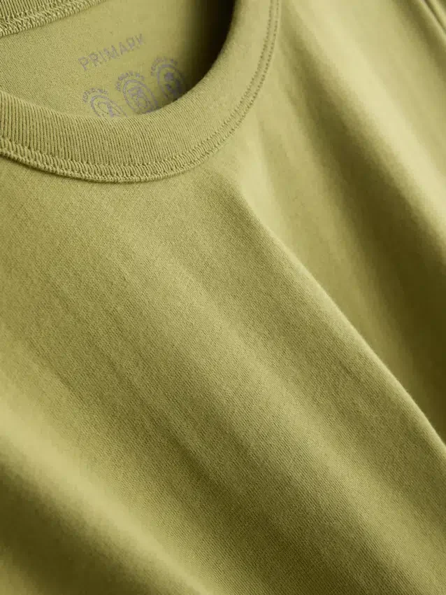 Bauchiges Baumwoll-T-Shirt mit Rundhalsausschnitt Bauchiges Baumwoll-T-Shirt mit Rundhalsausschnitt