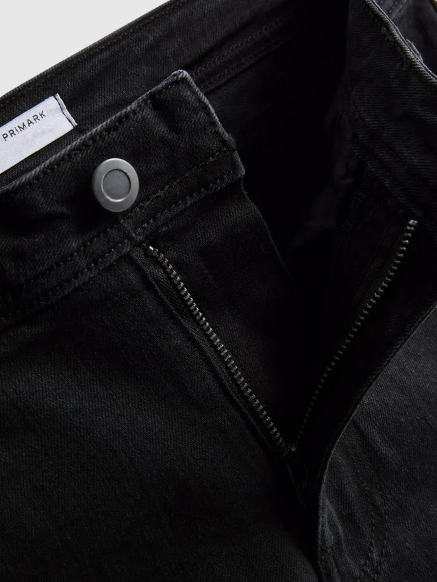 Baumwoll-Denim-Jeans mit ausgestelltem Bein und mittlerer Leibhöhe Baumwoll-Denim-Jeans mit ausgestelltem Bein und mittlerer Leibhöhe