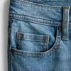Baumwoll-Denim-Jeans mit mittlerer Leibhöhe und ausgestelltem Bein Baumwoll-Denim-Jeans mit mittlerer Leibhöhe und ausgestelltem Bein