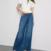 Baumwoll-Denim-Jeans mit mittlerer Leibhöhe und weitem Bein Baumwoll-Denim-Jeans mit mittlerer Leibhöhe und weitem Bein