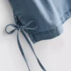 Baumwoll-Denim-Tanktop mit seitlichen Bindebändern Baumwoll-Denim-Tanktop mit seitlichen Bindebändern