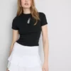 Baumwollreiches, kurzes Baby-T-Shirt mit Perlenverzierung