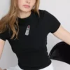 Baumwollreiches, kurzes Baby-T-Shirt mit Perlenverzierung