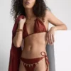 Bikini-Höschen mit Kettenverzierung und seitlichen Bindebändern Bikini-Höschen mit Kettenverzierung und seitlichen Bindebändern