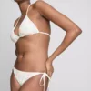 Bikini-Unterteil mit Muschelstickerei und seitlichen Bändern Bikini-Unterteil mit Muschelstickerei und seitlichen Bändern