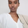 Bluse mit 3/4-Ärmeln und V-Ausschnitt Bluse mit 3/4-Ärmeln und V-Ausschnitt