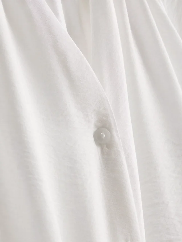 Bluse mit 3/4-Ärmeln und V-Ausschnitt Bluse mit 3/4-Ärmeln und V-Ausschnitt