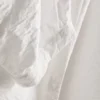 Bluse mit 3/4-Ärmeln und V-Ausschnitt Bluse mit 3/4-Ärmeln und V-Ausschnitt