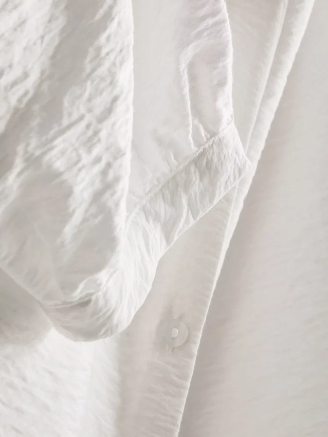Bluse mit 3/4-Ärmeln und V-Ausschnitt Bluse mit 3/4-Ärmeln und V-Ausschnitt